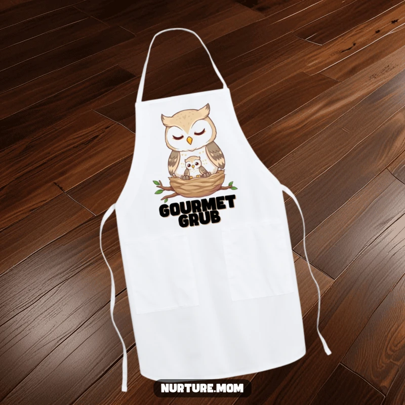 Funny owl nest apron with a gentle owl feeding a tiny fledgling, perfect for adding charm to cooking or baking.