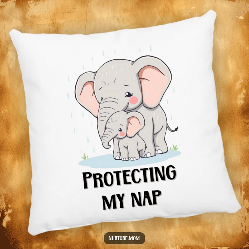 Pillow showcasing a mother elephant protectively covering her calf during a rain shower, offering comfort.