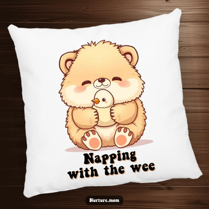Funny pillow showcases a soft fluffy animal carefully holding a tiny baby bird in its paws, a heartwarming and humorous comfort accessory.
