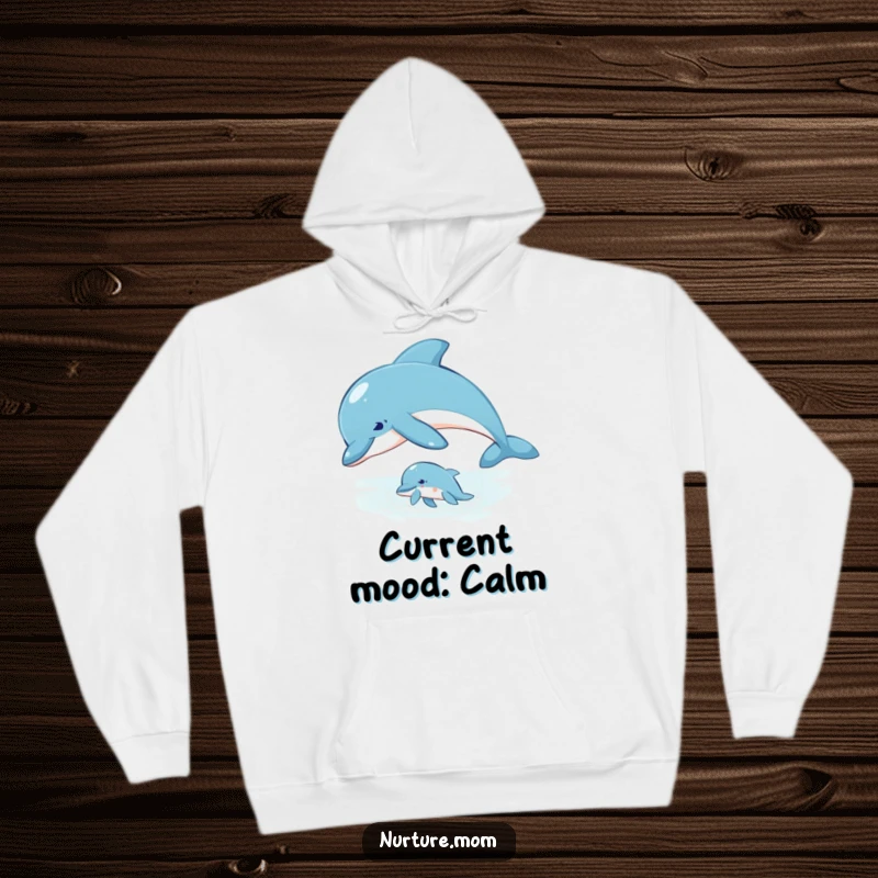 Hoodie design featuring a mother dolphin guiding her calf through the water, symbolizing wisdom and care.