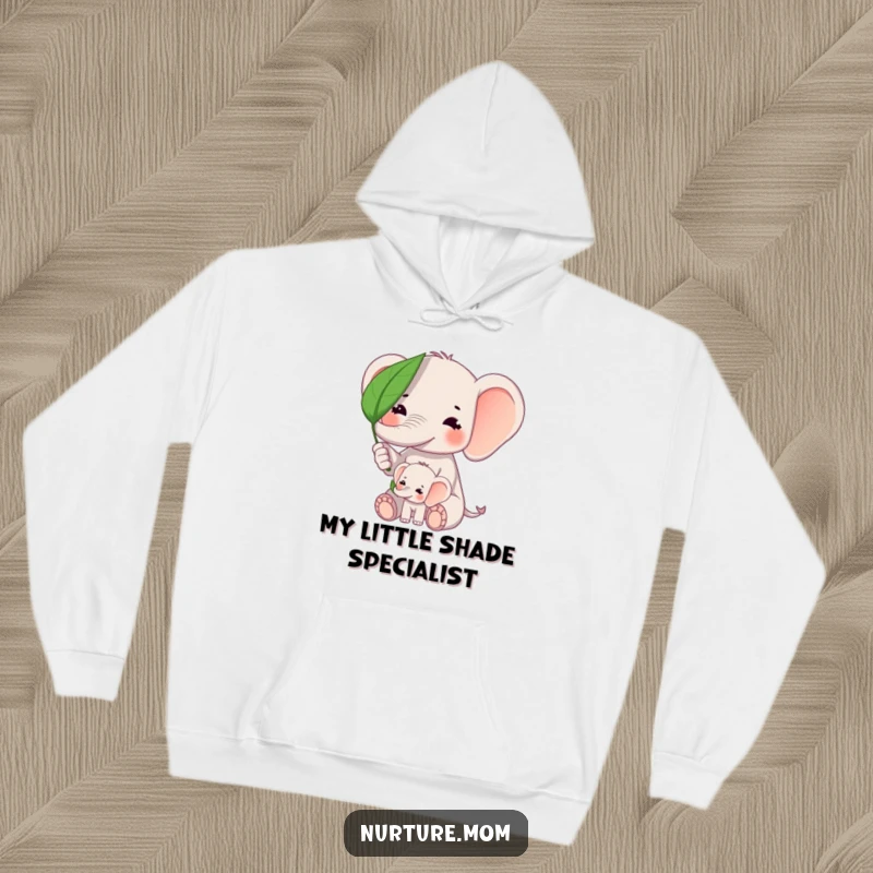 Funny kawaii elephant mom shielding baby elephant from sun with a leaf on a warm fleece hoodie.