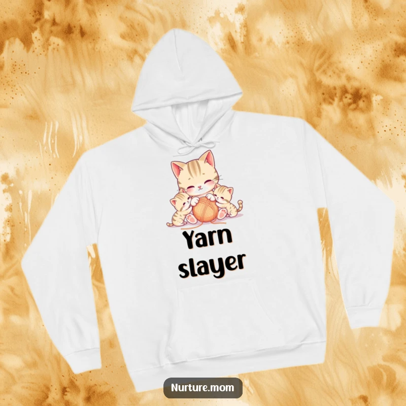 Funny kawaii mother cat playing with yarn and kittens, featured on a cozy hoodie.