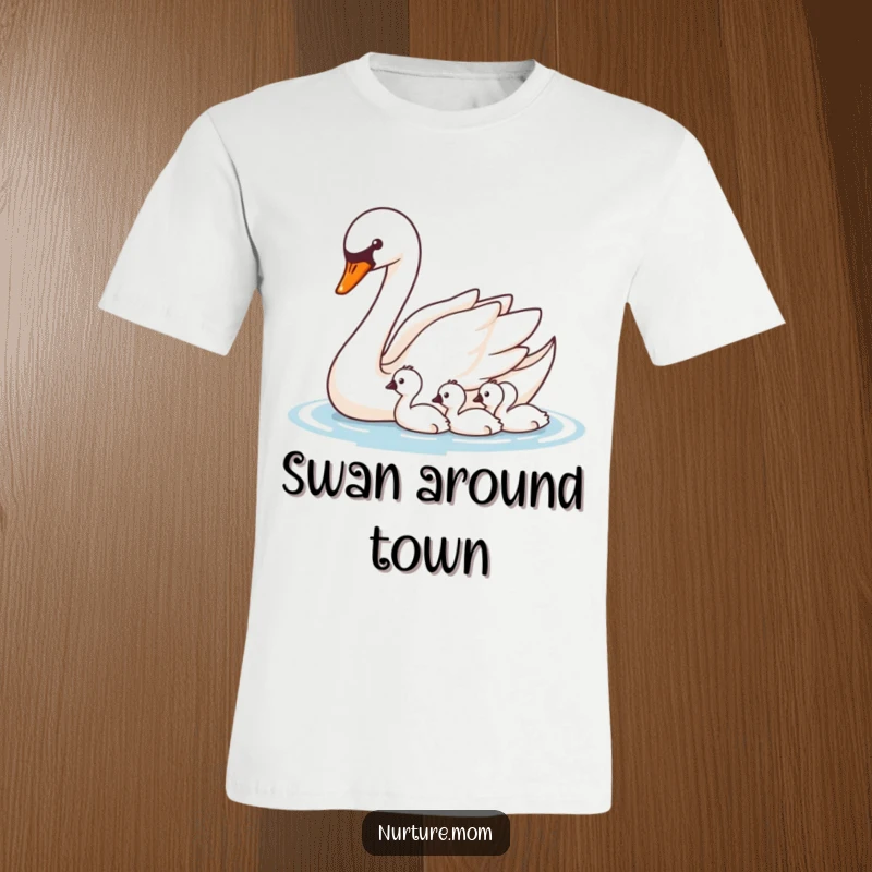 Funny Swan T-Shirt: Graceful mother swan gliding with her cygnets, showcasing elegant parenting and leadership.