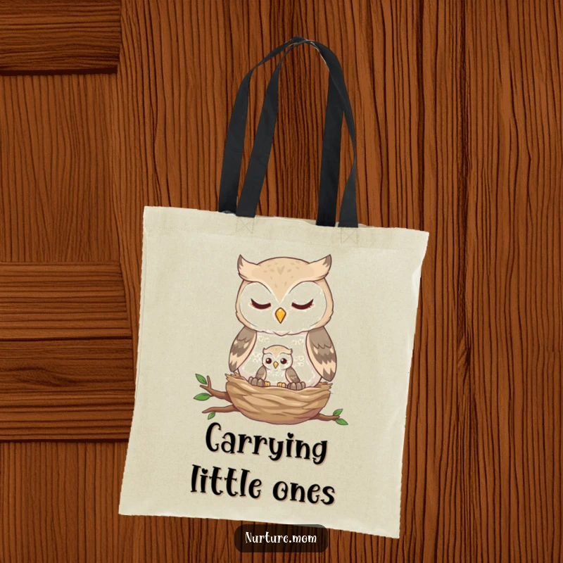 Funny owl nest tote bag depicting a gentle owl feeding a tiny fledgling, perfect for carrying essentials with a touch of care.